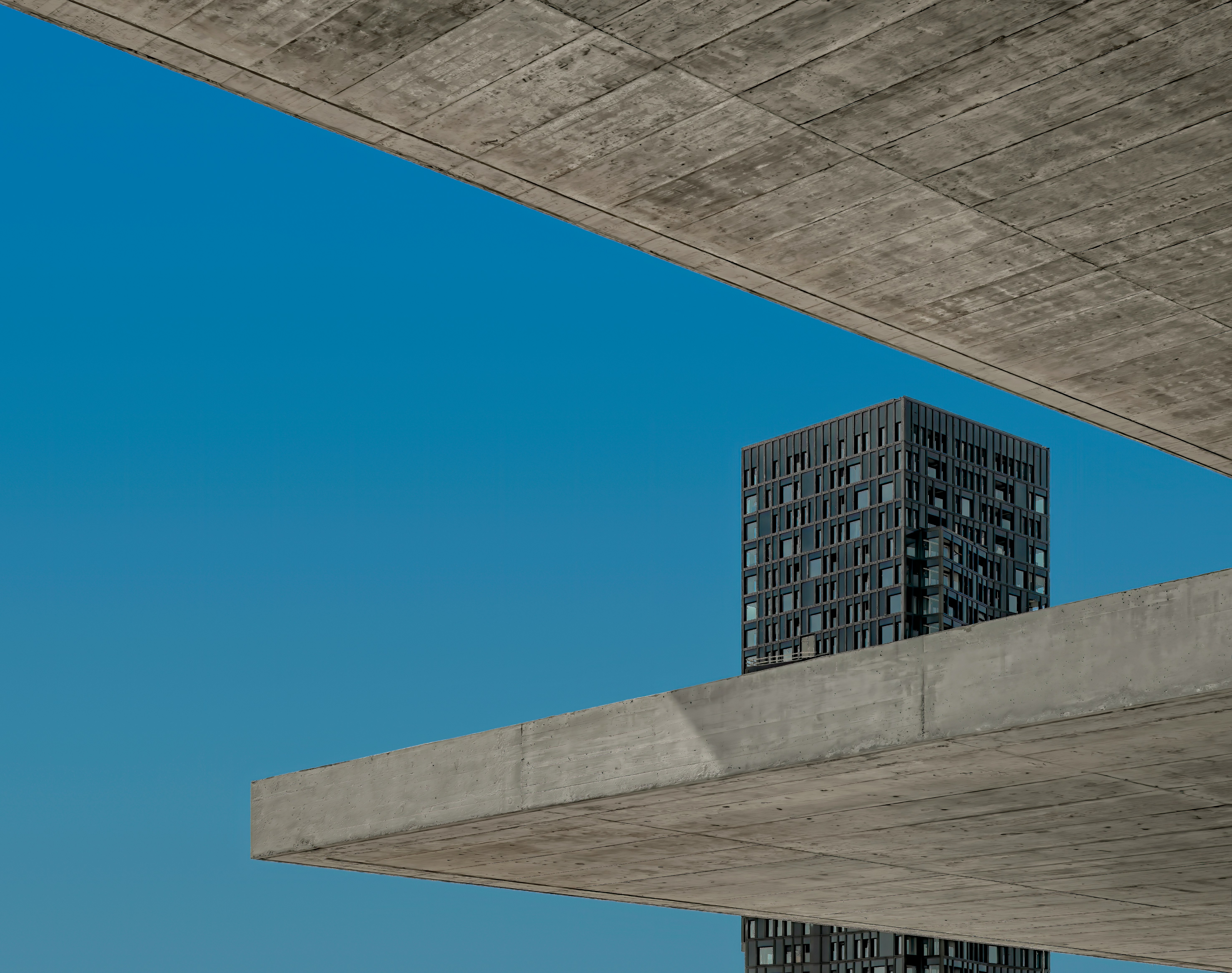 brown concrete building under blue sky during daytime